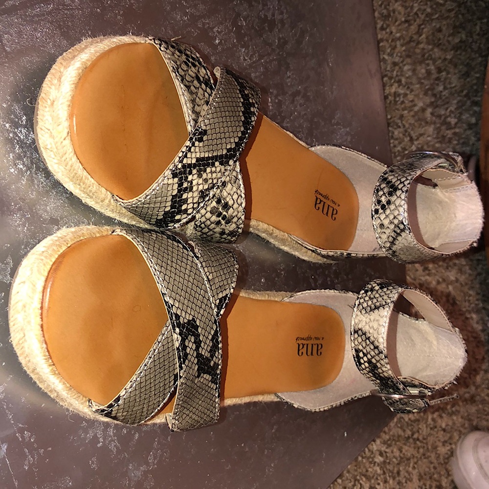 Brand new snake skin sandals .